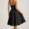 Angelina halternek midi-jurk met strikdetail in zwart
