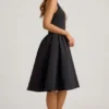 Angelina halternek midi-jurk met strikdetail in zwart