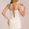 Aralyn kanten minijurk met corset in ivoor