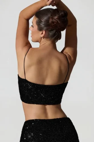 Ariana versierde crop top met uitsnijdingen in zwart