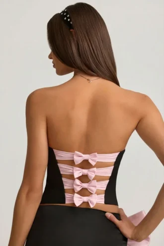Audrina korset-top met uitsnijdingen en strikdetail in zwart