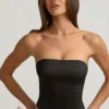 Audrina korset-top met uitsnijdingen en strikdetail in zwart