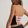 Audrina korset-top met uitsnijdingen en strikdetail in zwart
