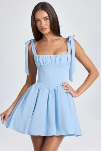 Bellamy gedrapeerde mini-corsetjurk in poederblauw