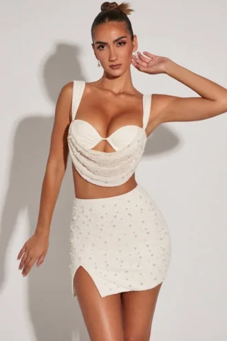 Belle Ile mini-rok met hoge taille en split op het bovenbeen in wit