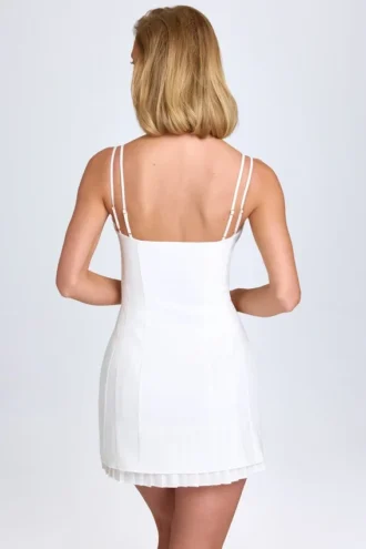 Bronwyn minijurk met strikdetail en plooien in wit