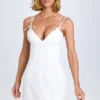 Bronwyn minijurk met strikdetail en plooien in wit