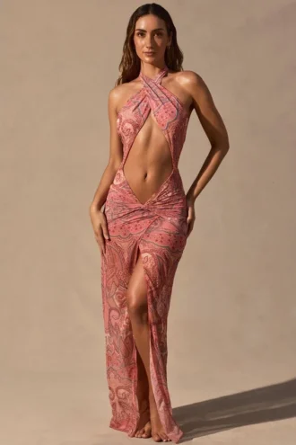 Caicos maxi-jurk met uitsnijdingen en halternek in paisleyprint