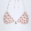 Calella driehoekige bikinitop met charm-detail in kersenprint