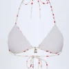 Calella driehoekige bikinitop met charm-detail in kersenprint