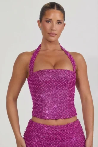 Caralie versierde halternek-corsettop in magenta