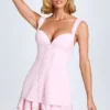 Cassandra minijurk met korset, ruches en knoopdetails in blush