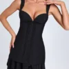 Cassandra minijurk met ruches en knoopdetails in zwart