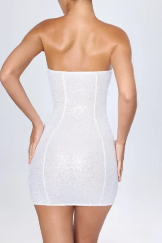 Cassidy versierde bandeau-minijurk in wit