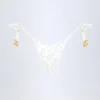 Cebu stringbikini met strik aan de zijkant en kralen in wit met luipaardprint