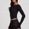 Charliane Modal top met boothals en lange mouwen in zwart