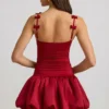 Cirilla minijurk met strikdetail en gerimpelde bubbelzoom in True Red