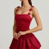 Cirilla minijurk met strikdetail en gerimpelde bubbelzoom in True Red