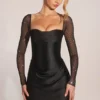 Clemmie minijurk met lange mouwen en drapering in zwart