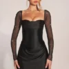 Clemmie minijurk met lange mouwen en drapering in zwart