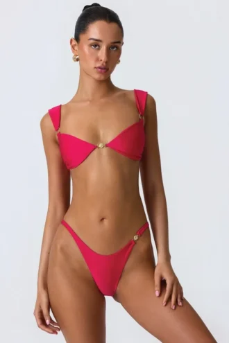 Coquina-bikini-top met versieringen in frambozenroze