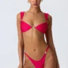 Coquina-bikini-top met versieringen in frambozenroze