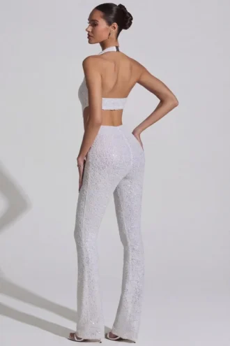 Coralena versierde jumpsuit met uitsnijdingen in wit