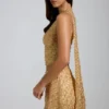 Cosette Top met asymmetrische sjaaldetails en versieringen in goud