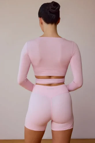 Crop top met lange mouwen en overslag in zachtroze