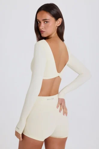 Crop top met lange mouwen in crème