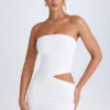 Damia minijurk met uitsnijdingen en bandeau in wit