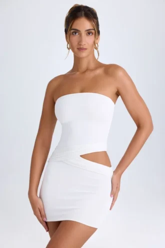 Damia minijurk met uitsnijdingen en bandeau in wit