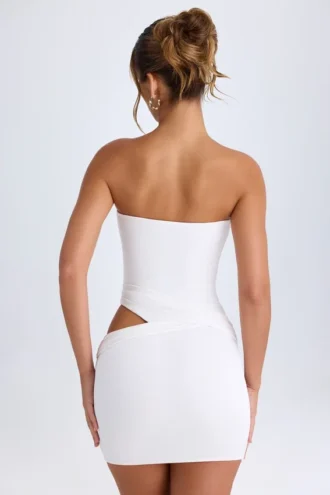 Damia minijurk met uitsnijdingen en bandeau in wit