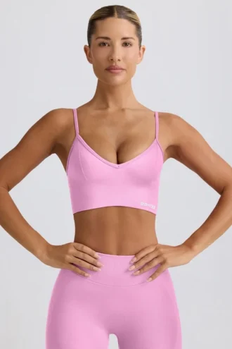 Define Luxe sportbeha met V-hals in bubblegumroze