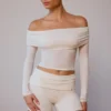 Doorschijnende off-shoulder top met lange mouwen in zacht wit