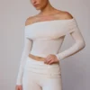 Doorschijnende off-shoulder top met lange mouwen in zacht wit