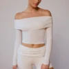 Doorschijnende off-shoulder top met lange mouwen in zacht wit