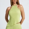 Elania asymmetrische haltertop met open rug in olijfgroen