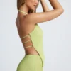 Elania asymmetrische haltertop met open rug in olijfgroen