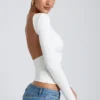 Elli Modal top met hoge hals, lange mouwen en open rug in wit