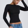 Elli Modal top met hoge hals, lange mouwen en open rug in zwart