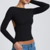 Elli Modal top met hoge hals, lange mouwen en open rug in zwart