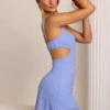 Emilion minijurk met versieringen en uitsnijdingen in poederblauw