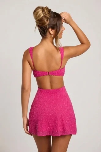 Emilion versierde mini-jurk met uitsnijdingen in fuchsia