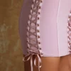 Emira korsetbandou-micromini-jurk met vetersluiting in mauve