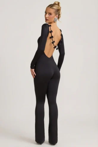 Eulalie slinky jersey jumpsuit met strikdetail in zwart