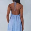 Evania halternek babydoll-minijurk met blauwe stippenprint