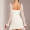 Ferrara minijurk met lange mouwen, versierde col en witte kleur