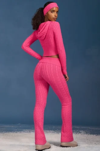Flared broek met omgeslagen zoom en kabelpatroon in felroze