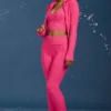 Flared broek met omgeslagen zoom en kabelpatroon in felroze